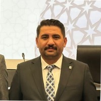 Tanju B.